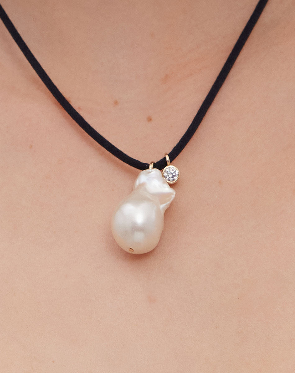 Meadowlark Cosmo Pearl and Stone Necklace - Gold/Garnet (close up on body)