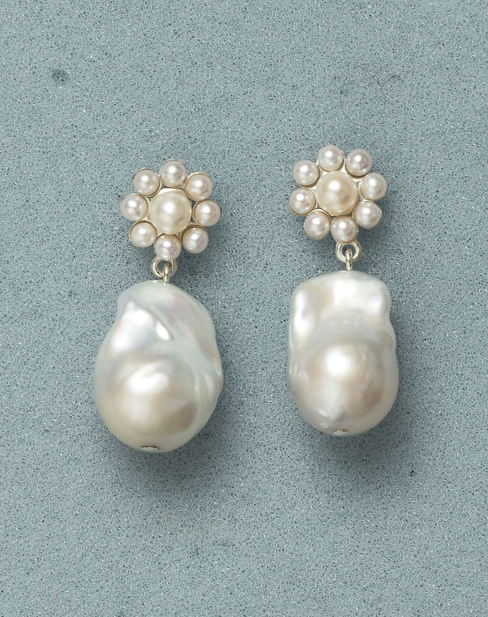 Meadowlark Emile Drop Earrings - Silver (styled, blue background)